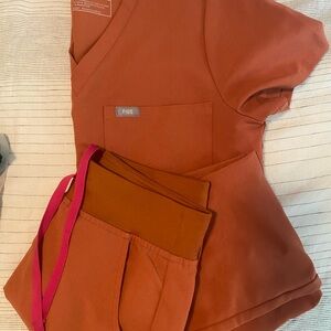 Figs Women's Scrub Set in orange pink exsmall/small